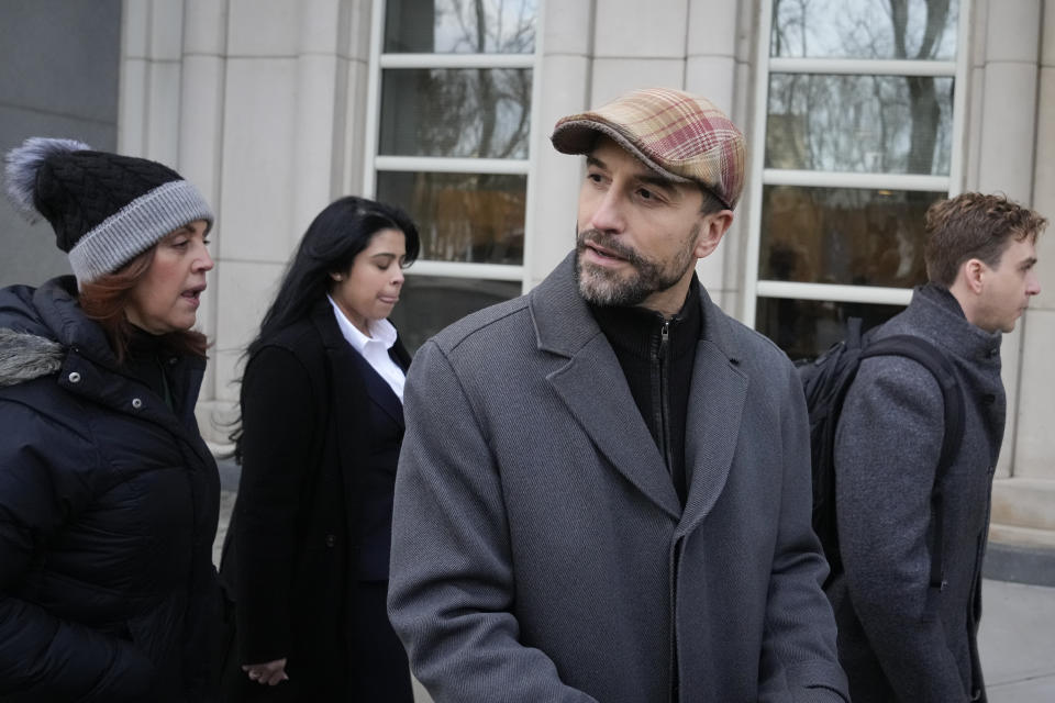 Cesar De Castro, attorney for Genaro Garcia Luna, Mexico's former top security official, arrives to Federal court in Brooklyn, Tuesday, Jan. 17, 2023, in New York. Luna goes on trial on charges of helping the Sinaloa Cartel traffic drugs and protect them from capture while he was serving as Mexico’s top security official. (AP Photo/John Minchillo)