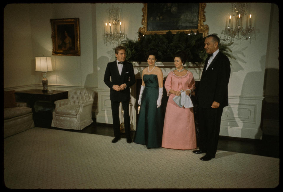 President Lyndon B. Johnson and first lady Lady Bird Johnson pose with Princess Margaret and the Earl of Snowdon.