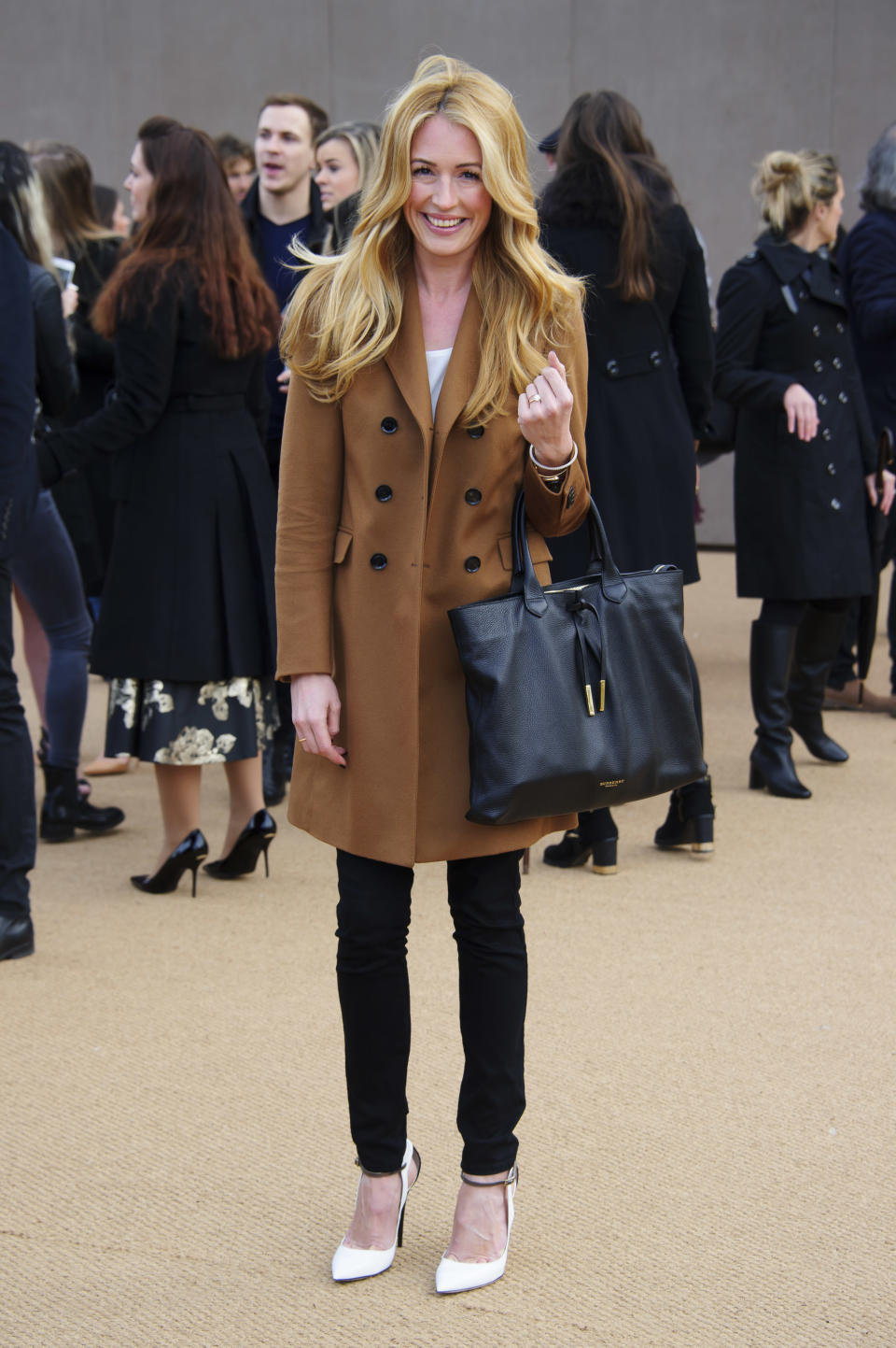 British television personality Cat Deeley arrives for the Burberry Prorsum Womenswear collection during London Fashion Week Autumn / Winter 2014 in central London, Monday, Feb. 17, 2014. (Photo by Jonathan Short/Invision/AP)