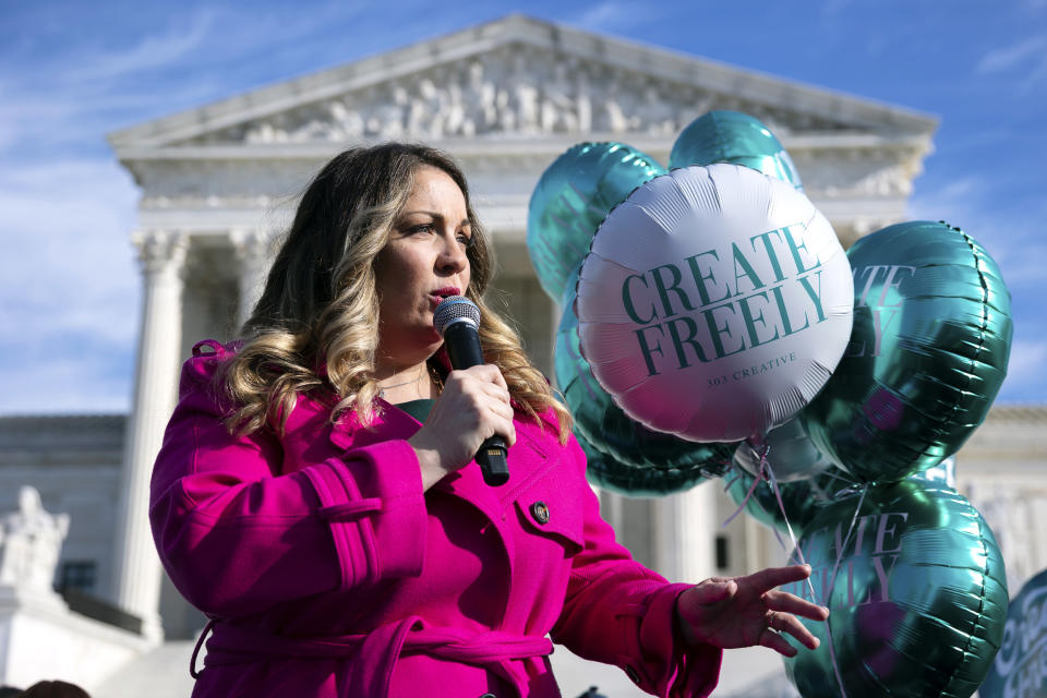 Lorie Smith at a rally outside the Supreme Court (Francis Chung / POLITICO via AP file )