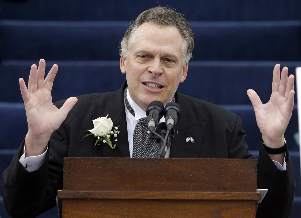 Virginia Gov. Terry McAuliffe delivers his inaugural address during ceremonies at the Capitol in Richmond, Va., Saturday, Jan. 11, 2014. McAuliffe was sworn in Saturday as the 72nd governor of Virginia. (AP Photo/Patrick Semansky)