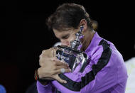 FILE - In this Sept. 8, 2019, file photo, Rafael Nadal, of Spain, hugs the trophy after defeating Daniil Medvedev, of Russia, to win the men's singles final of the U.S. Open tennis championships in New York. The U.S. Tennis Association intends to hold the U.S. Open Grand Slam tournament in New York starting in August without spectators, if it gets governmental support -- and a formal announcement could come this week. (AP Photo/Adam Hunger, File)