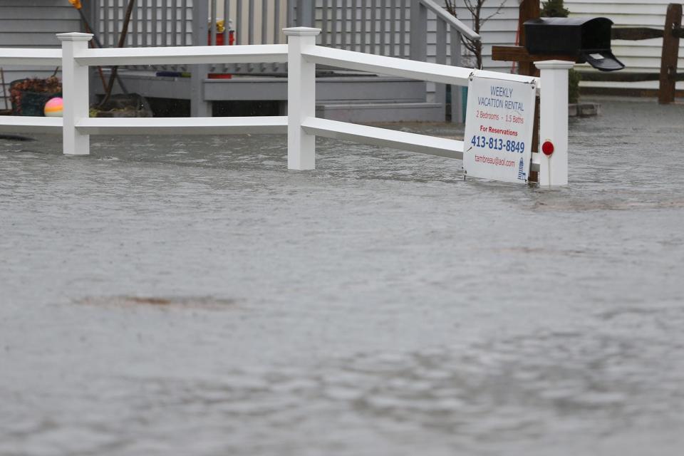 A winter storm rips through Hampton Beach leaving streets flooded and damage from high winds on Jan. 17, 2022.