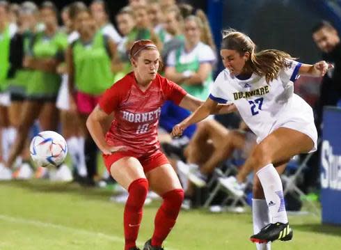 Nicole Drapluk (left), sister of Peoria Rivermen center Joe Drapluk, plays soccer at NCAA Div.-I Delaware State in a match against University of Delaware.