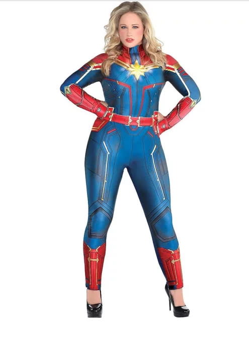 Model wears Captain Marvel catsuit costume