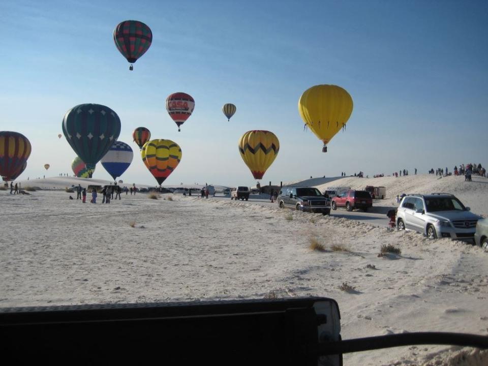 Hot Air Balloons get ready to take off, first thing in the morning at the 2022 White Sands Balloon Invitational