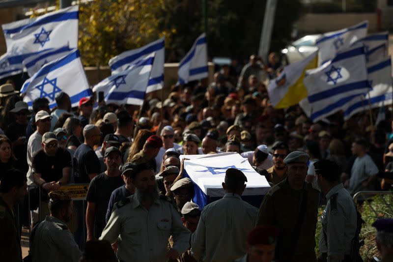 Friends and family mourn during Israeli soldier Corporal Noa Marciano's funeral, in Modiin