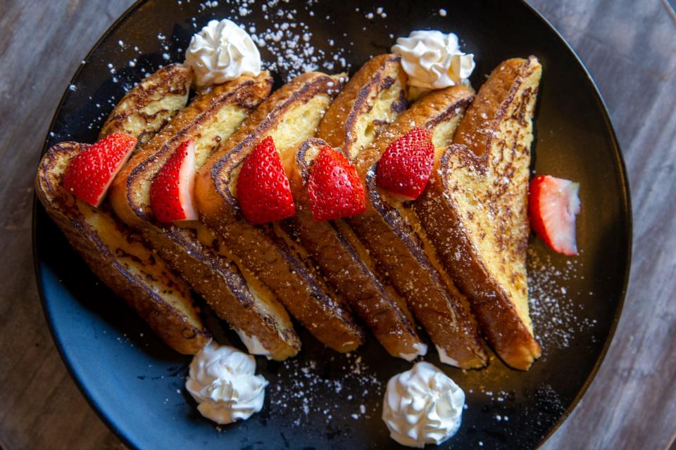 French toast with fresh berries and whipped cream at Elli's Backyard in Red Bank.