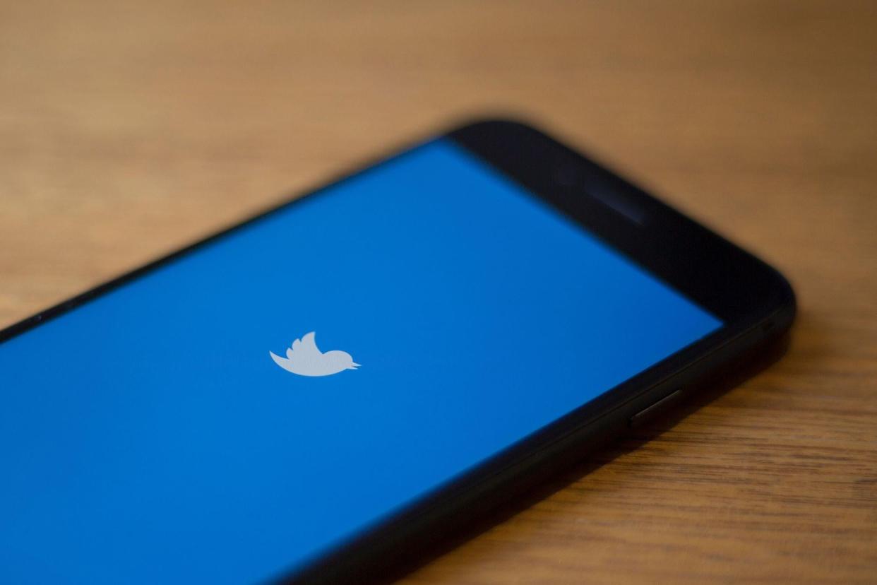 The Twitter logo is seen on a phone in this photo illustration in Washington, DC, on July 10, 2019: AFP/Getty