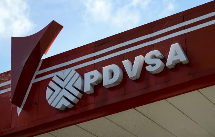 The United States has imposed sanctions on Venezuela's state oil company PDVSA, aimed at preventing Maduro from diverting resources until control can be transferred to an interim government (AFP Photo/Federico PARRA)