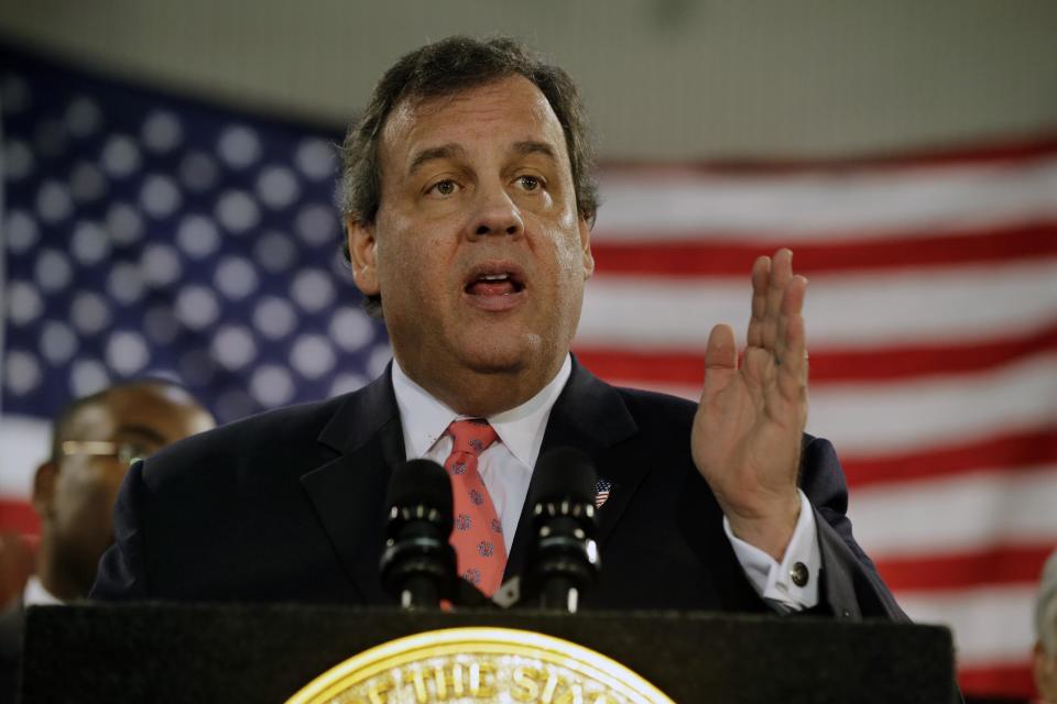 New Jersey Gov. Chris Christie addresses a gathering of home owners Thursday, Jan. 16, 2014, in Manahawkin, N.J., who were affected by last year's Superstorm Sandy. Christie spoke to Superstorm Sandy victims one week after the meeting was hastily canceled because of a scandal over traffic jams that appear to have been manufactured by his aides. Christie and Community Affairs Commissioner Richard Constable III announced a Sandy housing recovery milestone Thursday as the governor seeks to put the traffic scandal behind him. (AP Photo/Mel Evans)