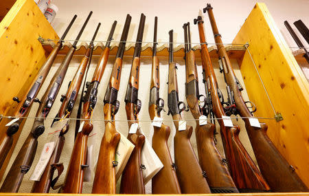 Sporting guns are displayed at Wyss Waffen gun shop in the town of Burgdorf, Switzerland August 10, 2016. REUTERS/Arnd Wiegmann