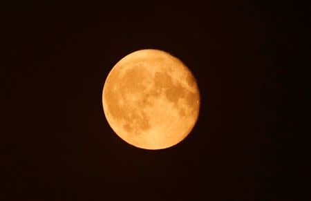 The super moon appears in the sky in Cairo, Egypt, in this file photo taken October 17, 2016. REUTERS/Amr Abdallah Dalsh/File Photo