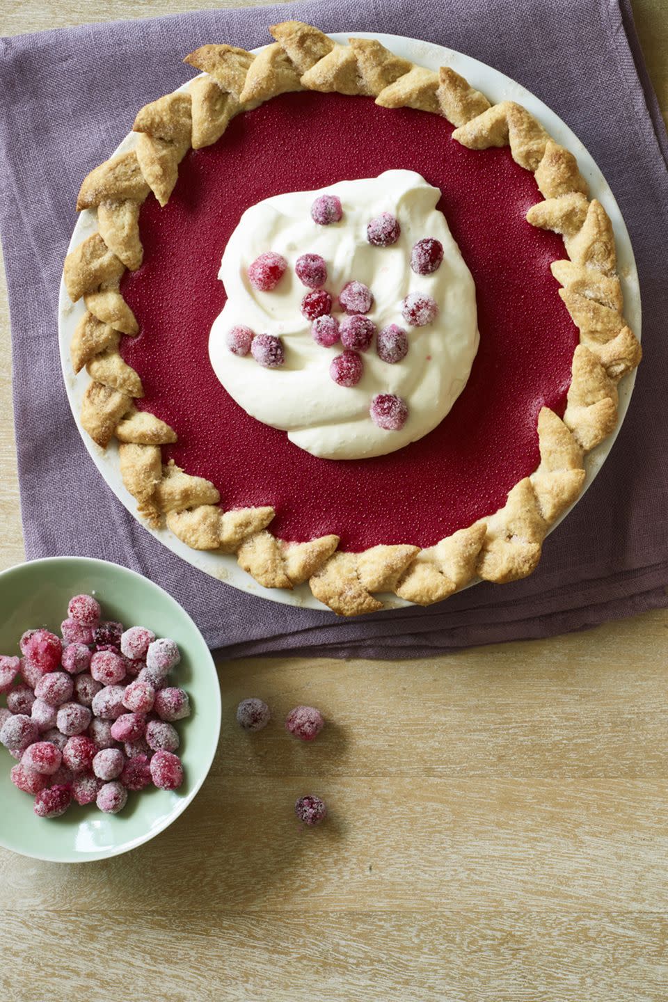 <p>This bright and vibrant red cranberry pie is the perfect combo of tangy and sweet.</p><p><em><strong><a href="https://www.womansday.com/food-recipes/food-drinks/recipes/a60506/cranberry-pie-with-snickerdoodle-crust-recipe/" rel="nofollow noopener" target="_blank" data-ylk="slk:Get the Cranberry Pie with Snickerdoodle Crust recipe;elm:context_link;itc:0;sec:content-canvas" class="link ">Get the Cranberry Pie with Snickerdoodle Crust recipe</a>.</strong></em></p>