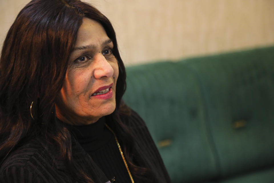 Iraqi Singer Sajda Obeid gives an interview to The Associated Press, in Irbil, Iraq, Friday, Dec. 10, 2021. Obeid said that she will never stop performing. For older Iraqis, the 63-year old is a symbol of a bygone golden era. To the young, her upbeat love songs and subtly racy lyrics have become a channel for self-expression in a largely conservative society. (AP Photo/Hussein Ibrahim)