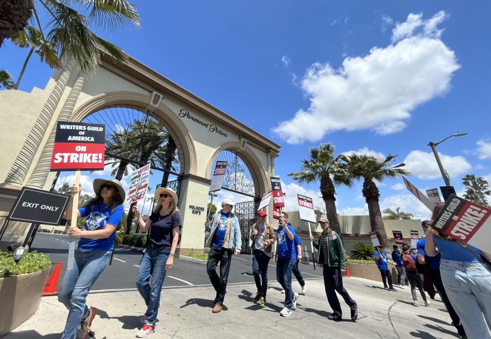 WGA members picketing in front of Paramount Pictures in Hollywood. (Genaro Molina / Los Angeles Times)
