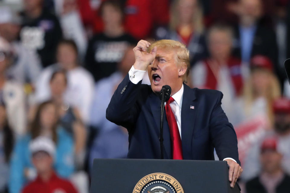 President Donald Trump gestures as he references Sen. Chuck Schumer, D-N.Y., while speaking at a campaign rally in Bossier City, La., Thursday, Nov. 14, 2019. (AP Photo/Gerald Herbert)