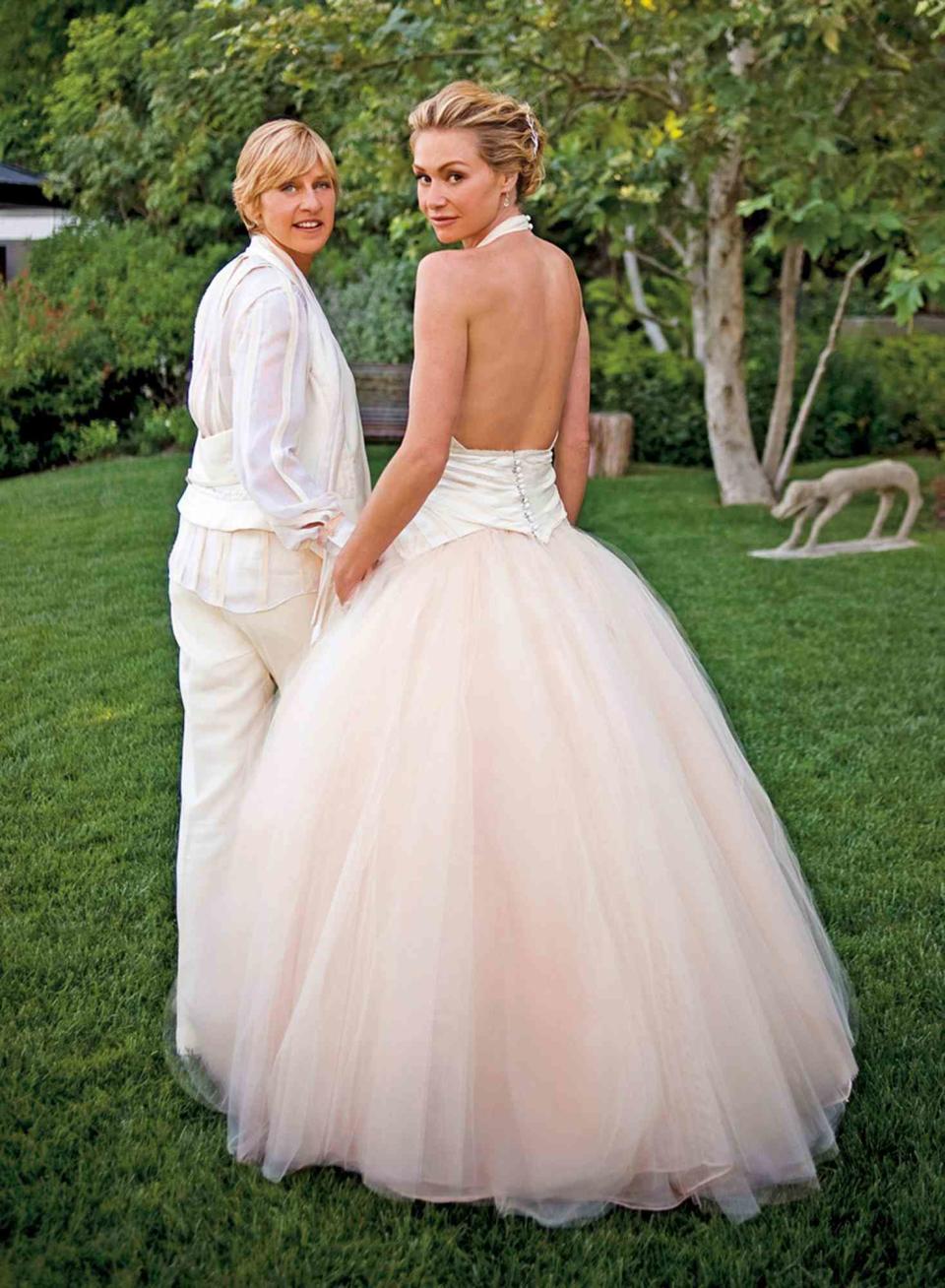 Ellen DeGeneres and actress Portia de Rossi pose for photos celebrating their marriage in the backyard of their home on August 16, 2008 in Beverly Hills, California.