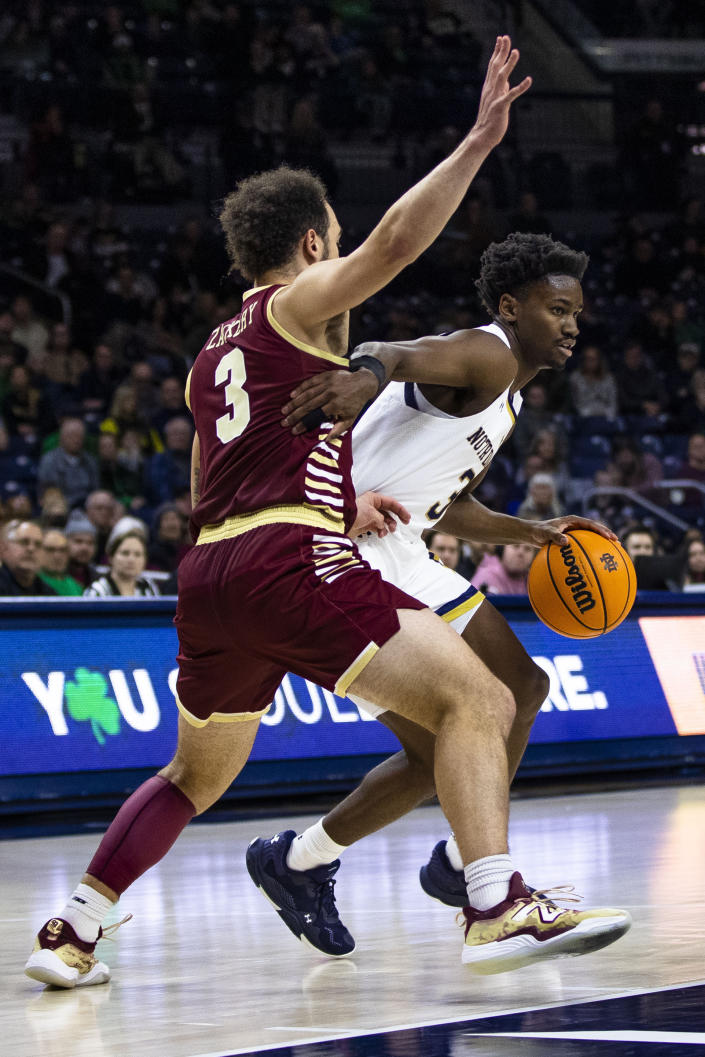 Notre Dame's Trey Wertz (3) tries to get around Boston College's Jaeden Zackery (3) during the second half of an NCAA college basketball game Saturday, Jan. 21, 2023 in South Bend, Ind. (AP Photo/Michael Caterina)