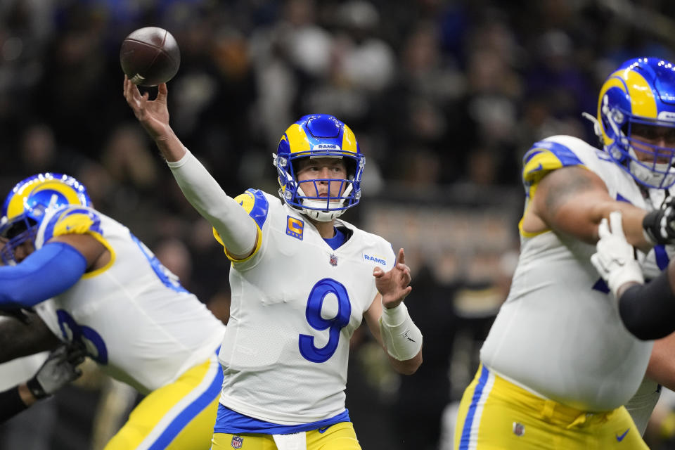 Los Angeles Rams quarterback Matthew Stafford (9) passes against the New Orleans Saints in the first half of an NFL football game in New Orleans, Sunday, Nov. 20, 2022. (AP Photo/Gerald Herbert)