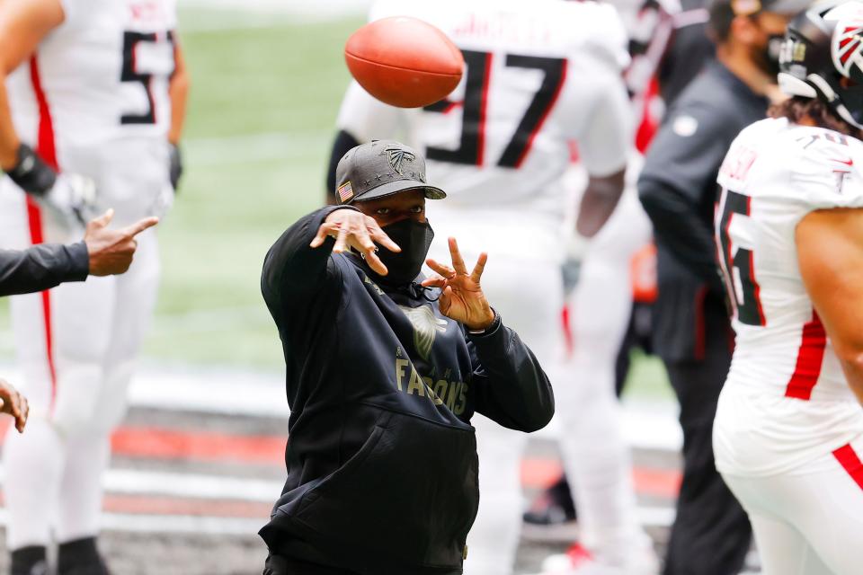 ATLANTA, GEORGIA - NOVEMBER 08: Interim head coach Raheem Morris throws a ball before the game against the Denver Broncos at Mercedes-Benz Stadium on November 08, 2020 in Atlanta, Georgia. (Photo by Kevin C. Cox/Getty Images)