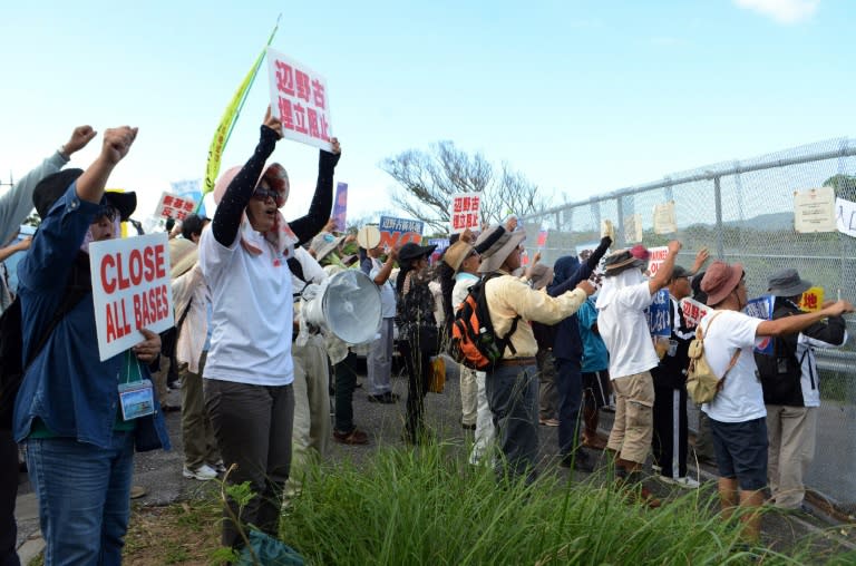 Japanese protest against resuming work on a new US military base at Nago, near Henoko on the southern island of Okinawa in September 2015