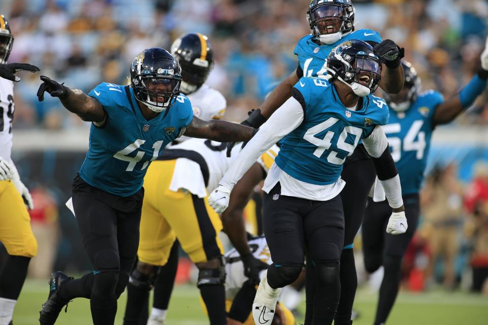 Jaguars' defensive end Arden Key (49), seen here reacting to a sack against the Pittsburgh Steelers in preseason and joined in celebration by Josh Allen (41) and Travon Walker (44), hopes to play a key part of a 2022 defense that should show dramatic improvement.
