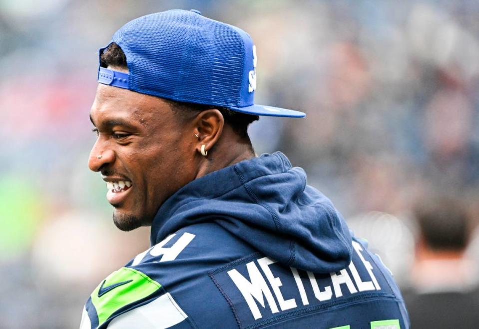 Seattle Seahawks wide receiver DK Metcalf (14) stands on the sidelines before the game against the Arizona Cardinals at Lumen Field, Sunday, Oct. 22, 2023, in Seattle, Wash.