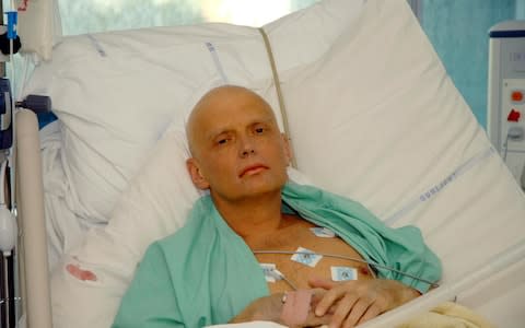 Former Russian security agent Alexander Litvinenko in his hospital bed after being poisoned with polonium 210 - Credit: PA