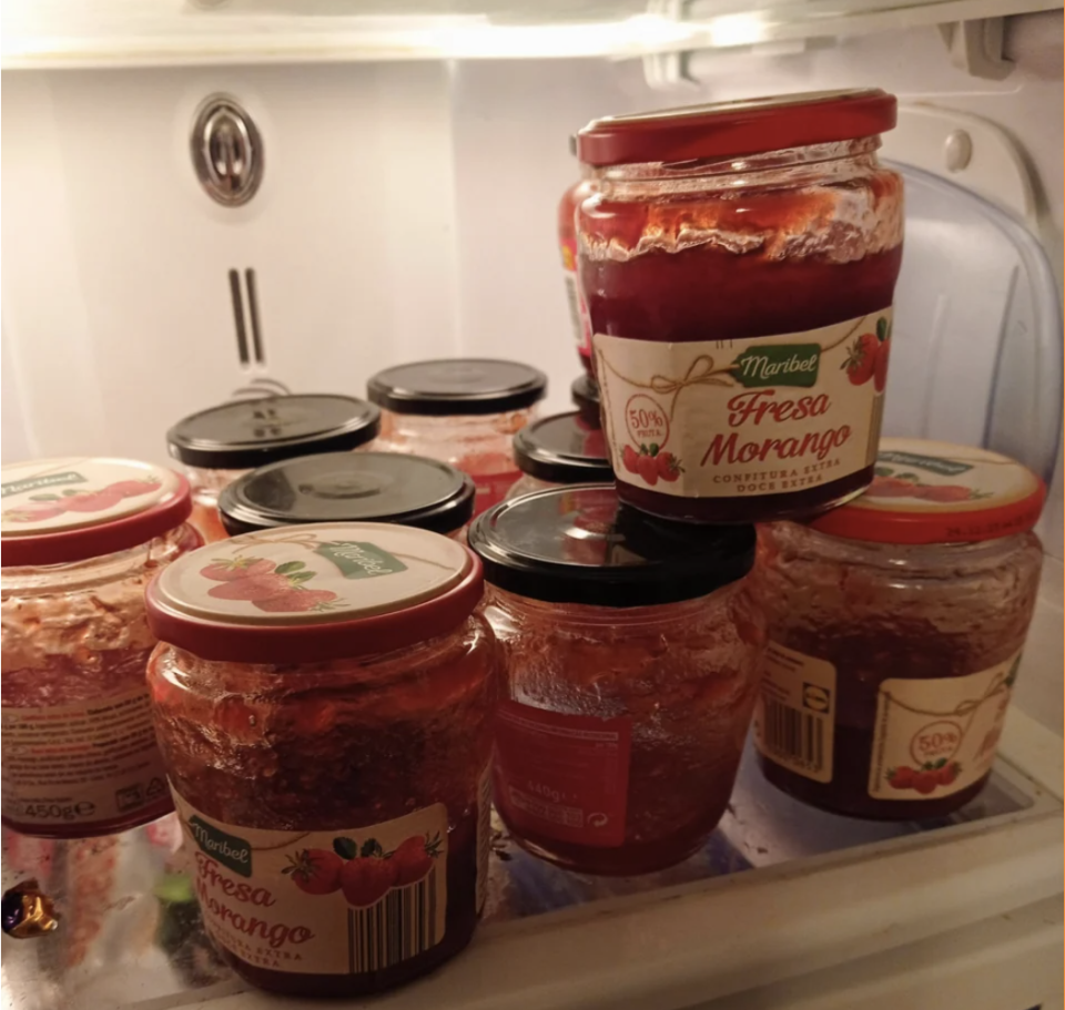 half used jars of jam in the fridge