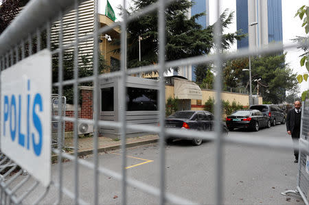 A member of security staff is seen next to the barriers at the gate of Saudi Arabia's consulate in Istanbul, Turkey, October 21, 2018. REUTERS/Osman Orsal