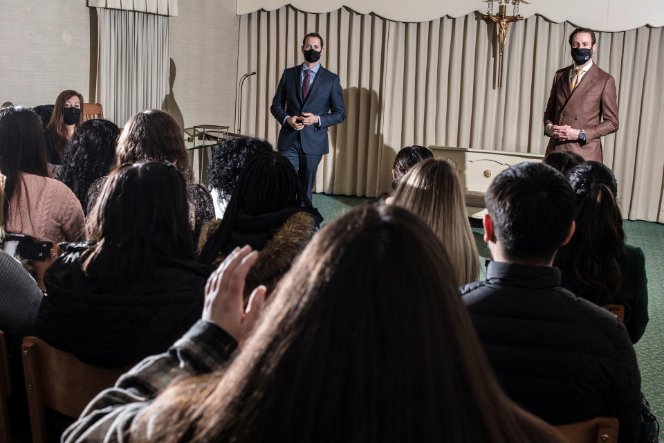 Funeral directors Aaron Tirpack, left, and Frank Galante, right, speak to students during professor Norma Bowe’s Kean University course Death in Perspective at Galante Funeral Home in Union, N.J., on Feb. 2, 2022<span class="copyright">Bryan Anselm for TIME</span>