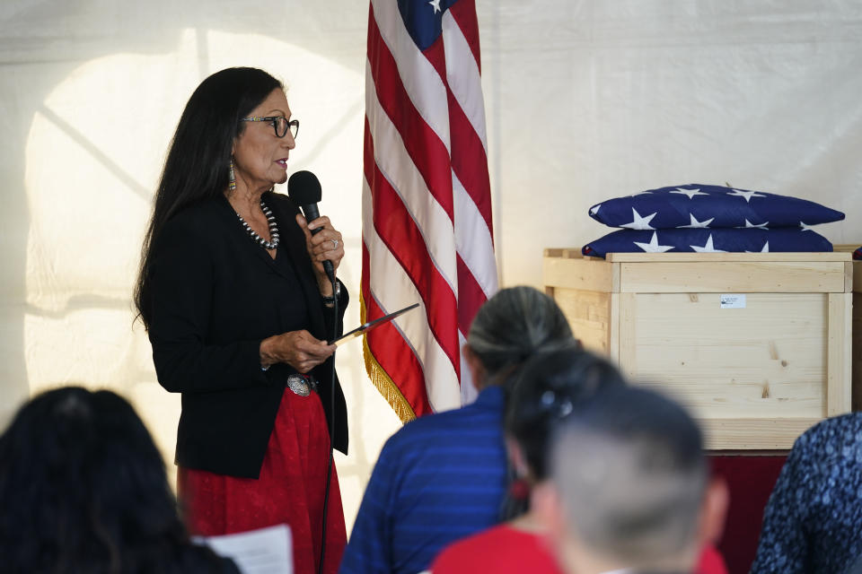 Interior Secretary Deb Haaland speaks during a ceremony at the U.S. Army's Carlisle Barracks, in Carlisle, Pa., Wednesday, July 14, 2021. The disinterred remains of nine Native American children who died more than a century ago while attending a government-run school in Pennsylvania were headed home to Rosebud Sioux tribal lands in South Dakota on Wednesday after a ceremony returning them to relatives. (AP Photo/Matt Rourke)