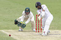 India's Shardul Thakur bats during play on day three of the fourth cricket test between India and Australia at the Gabba, Brisbane, Australia, Sunday, Jan. 17, 2021. (AP Photo/Tertius Pickard)