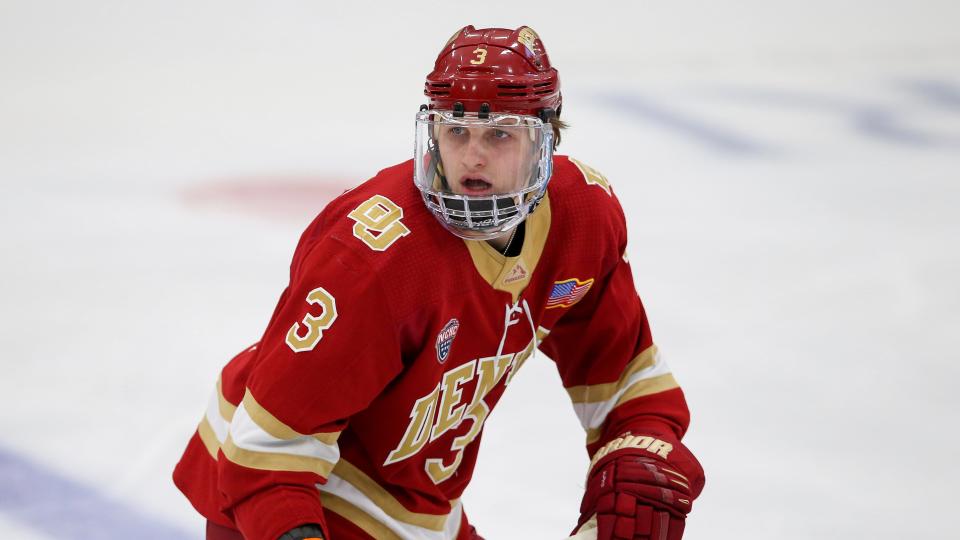 Denver's Antti Tuomisto skates during the second period of the game against Providence on Friday, Oct. 22, 2021, in Providence, Rhode Island.