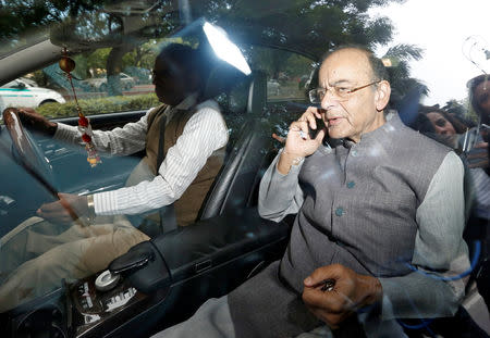 India's Finance Minister Arun Jaitley speaks on his mobile phone as he leaves after attending the Cabinet Committee on Security (CCS) meeting at the prime minister's residence in New Delhi, February 26, 2019. REUTERS/Adnan Abidi