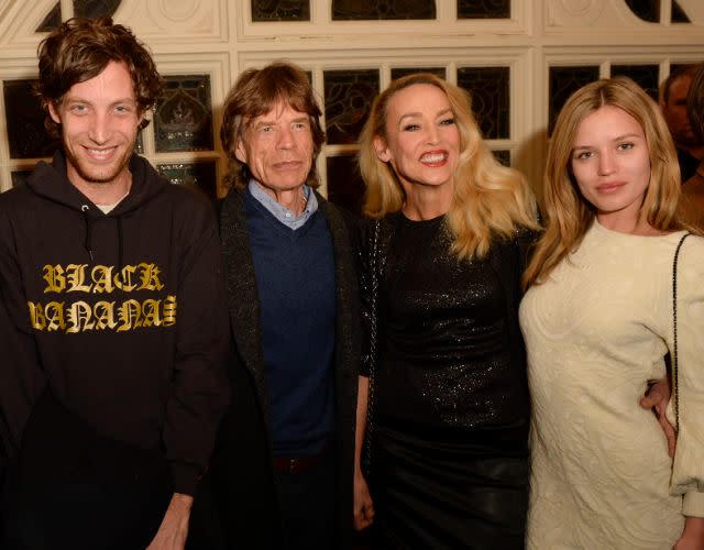 RICHMOND, ENGLAND – DECEMBER 11: (L to R) James Jagger, Sir Mick Jagger, Jerry Hall and Georgia May Jagger attend the press night performance of “Snow White And The Seven Dwarfs” at the Richmond Theatre on December 11, 2014 in Richmond, England. (Photo by David M. Benett/Getty Images)