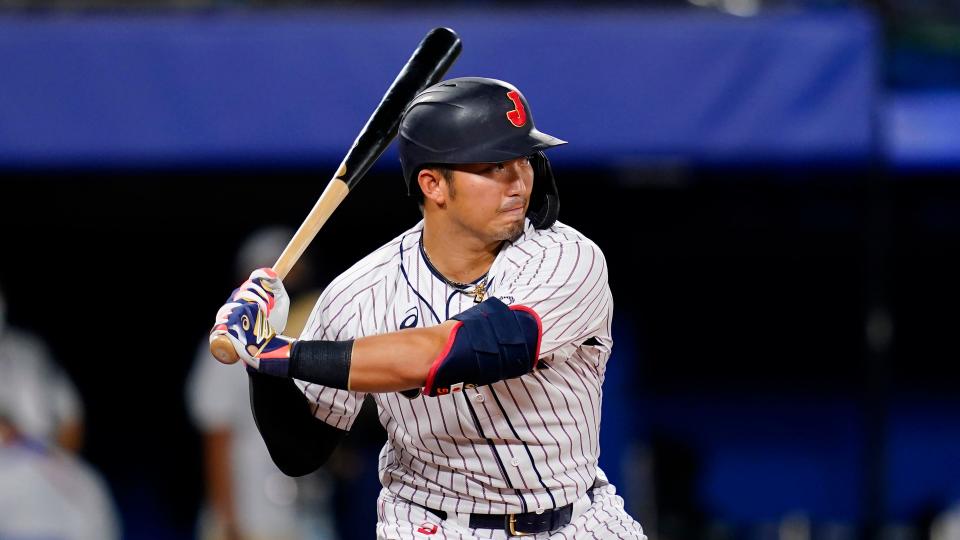 Japan's Seiya Suzuki bats during a semifinal game against South Korea at the 2020 Summer Olympics in Tokyo.