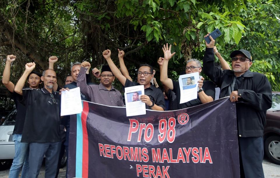 Members of six non-governmental organisations are seen gathering outside the Ipoh district police headquarters August 26, 2019. — Pictures by Farhan Najib