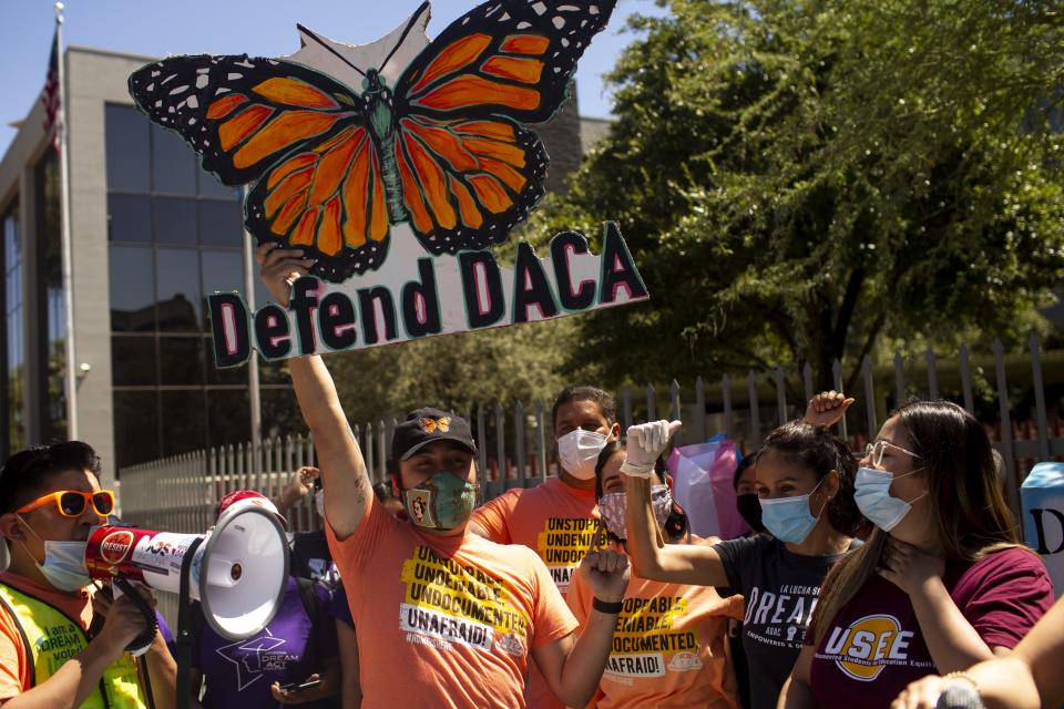 Activists, DACA recipients, and others rally in support of the United States Supreme Court ruling on the Deferred Action for Childhood Arrivals program outside of the U.S. Immigration and Customs Enforcement headquarters in Phoenix, Ariz. on June 18, 2020.