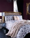 <b>Grand opulence</b><br><br>For five-star opulence, team sumptuous patterned bedlinen with rich wall colours. Gold always lends a scheme instant glamour, and the gilt bedhead and mirror look stunning against the deep purple. <br><br>The art deco-inspired duvet in cool grey, available from <a href="http://www.houseoffraser.co.uk/Biba+Evie+bed+linen/EvieBiba,default,pd.html" rel="nofollow noopener" target="_blank" data-ylk="slk:House of Fraser;elm:context_link;itc:0;sec:content-canvas" class="link ">House of Fraser</a> adds interest and breaks up any heaviness, while the fake-fur throw and cushion add a touch of luxury.