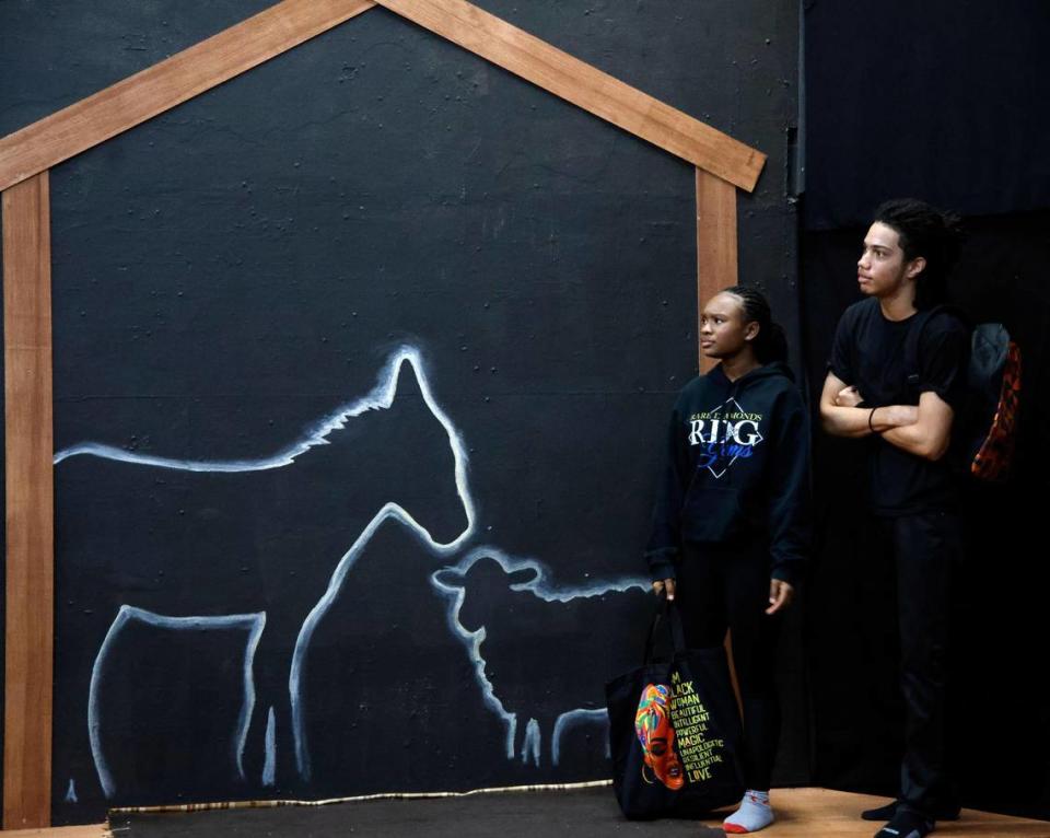 Mia Fullerton, 14, and Raymond Whitney,16, during rehearsal for “Bone Soup: A Kwanza Story” at the Jubilee Theatre supported by the Maroon 9 Community Enrichment Organization, an organization provides after school enrichment youth programs.