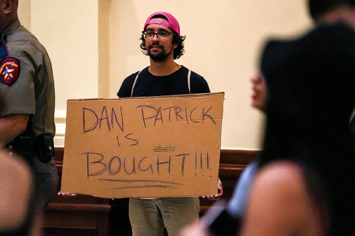 Anthony Carter protests the acquittal of Attorney General Ken Paxton at the Texas Capitol on Saturday, Sep. 16.  "I had such faith that our Senate would do the right thing. I'm very angry and I just wish there was some accountability," Carter said.