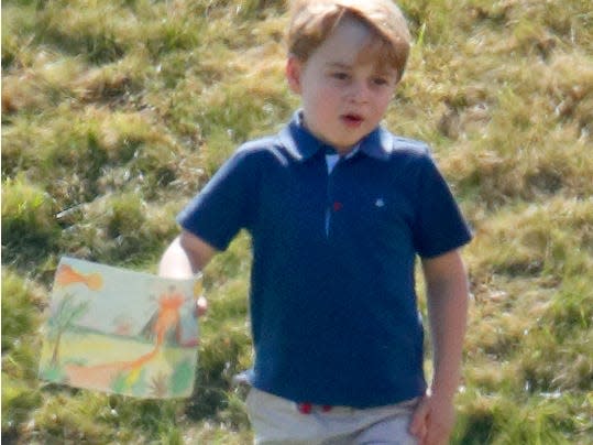 Prince George with his drawing.