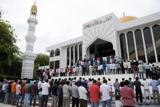 Maldives' Muslims pictured attending Friday prayers in Male. Religious origins of the Maldivian people are not clearly established, but it is believed that a Buddhist king converted to Islam in the 12th century