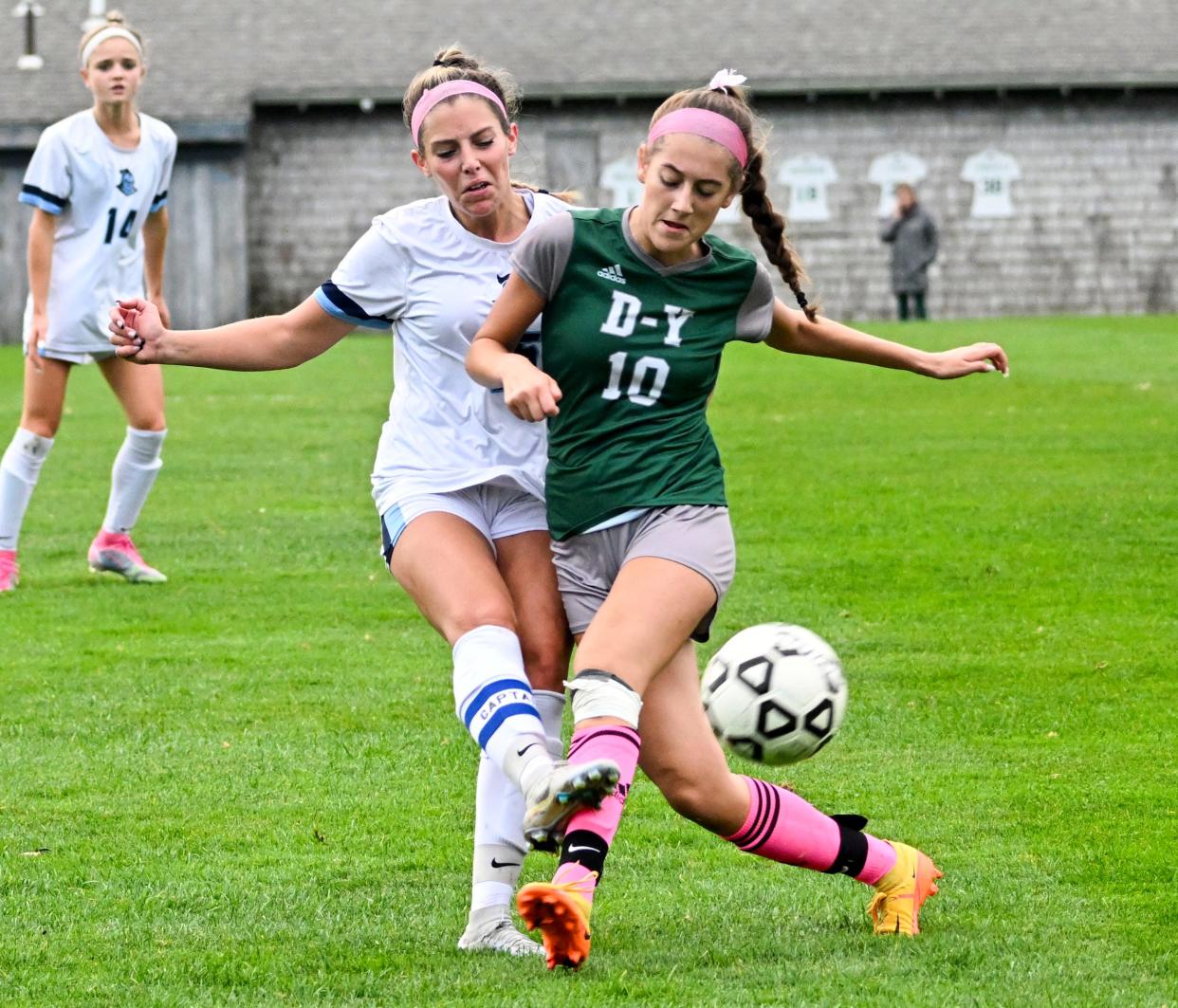 SOUTH YARMOUTH  10/25/22   Emma Gallagher of D-Y attempts to stop a pass by Sophia Ricciardi of Sandwich.