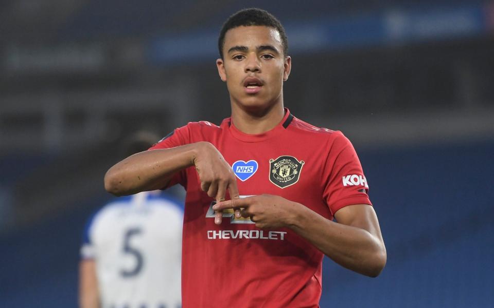 Mason Greenwood of Manchester United scores and celebrates his goal at Brighton  - Kevin Quigely