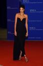 <p>For a correspondent’s dinner hosted by the White House, Kendall opted for a more conservative look than usual: a strapless midnight blue dress by British designer Vivienne Westwood. [Photo: Getty] </p>