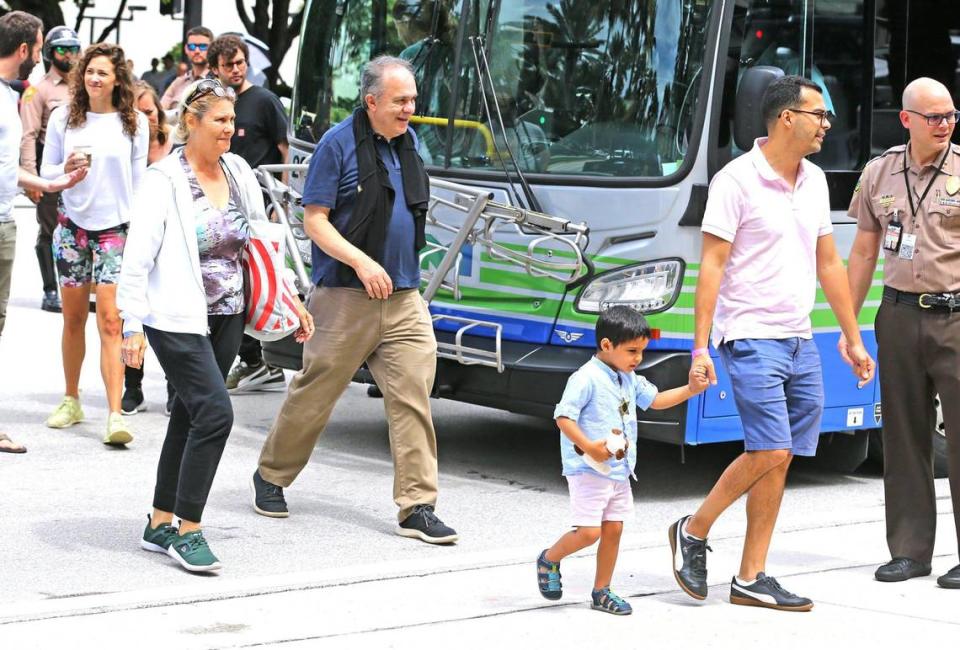 Family of the victims of the Champlain Towers South condo building collapse arrive at the St. Regis Hotel to meet with President Joe Biden in Bal Harbour, Florida, July 1, 2021. The building collapsed early Thursday morning, 6/24, trapping over a 150 victims.