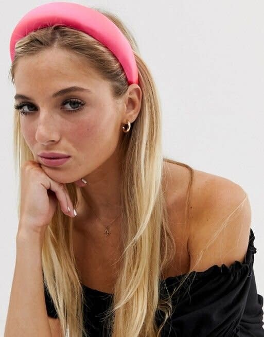 <strong><a href="https://us.asos.com/asos-design/asos-design-padded-headband-in-hot-pink-satin/prd/12341765?clr=pink&amp;colourWayId=16415311&amp;SearchQuery=headband" target="_blank" rel="noopener noreferrer">Get this padded headband from ASOS for $9.50.﻿</a></strong>